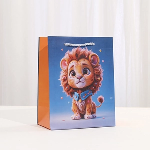 Navy blue tiger gift bag with cute cartoon illustration and sturdy white rope handles