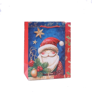 Christmas gift paper bag with Santa Claus illustration and red woven rope handles