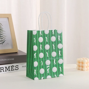 Detail of green golf gift bag with white twisted handle and athlete silhouette print