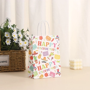 Detail of Cinco de Mayo gift bag with festive Mexican motifs and white rope handle