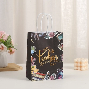 Happy Teacher's Day paper gift bag with colorful school illustrations and white rope handles