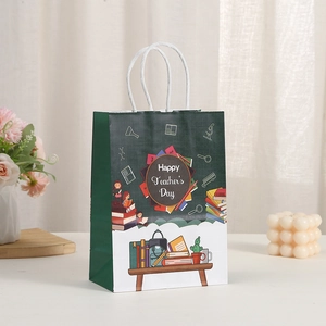 Happy Teacher's Day paper gift bag with school illustrations and white cord handle