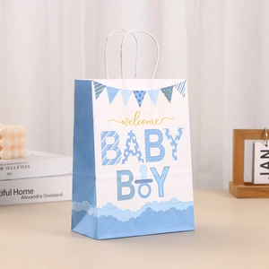 Blue and white welcome baby boy gift bag with cloud patterns and soft rope handles
