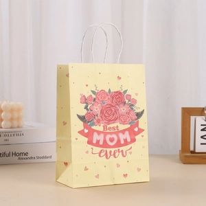 Floral Mother's Day gift bag with Best MOM ever print and white paper twist handles