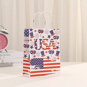Patriotic USA kraft paper gift bag with stars, fireworks and balloons for celebration