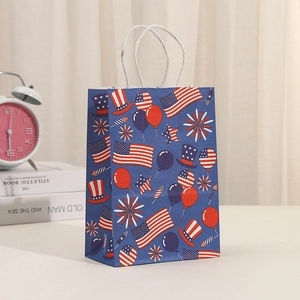 Patriotic gift bag with American flag design and white paper handles for holidays