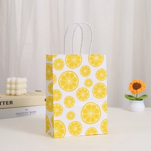 Kraft paper shopping bag with vibrant lemon prints and durable white rope handles