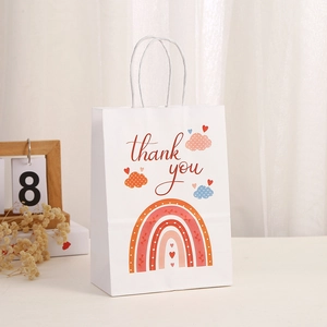 Bohemian rainbow kraft gift bag with red thank you text and white twisted handles