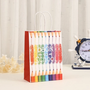 Vertical kraft paper gift bag with Back to School print and rainbow pencil design