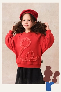 Detail of red girls sweatshirt with ruffled texture and knitted cotton fabric