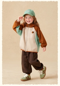 Detailed full view of kids color-block outdoor jacket and matching brown cargo pants