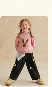 Pink little bunny sweatshirt and black wide-leg trousers for girls' casual spring outfit