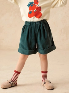 Retro dark green corduroy shorts for girls with elastic waist and rolled hem design
