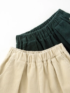 Girls corduroy shorts in dark green and beige with elastic waist and cuffed hems