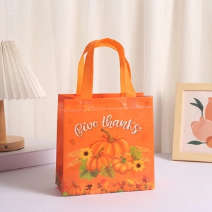 Close-up of Give thanks text on orange marble pumpkin gift bag for Thanksgiving