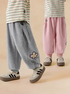 Girls floral print joggers with ribbed cuffs and striped cotton long sleeve shirts