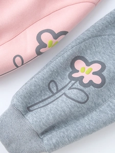 Girl's pink and gray floral jogger pants made of soft cotton with ribbed ankle cuffs