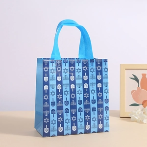 Blue Hanukkah non-woven gift bag with Star of David and Menorah print for holidays