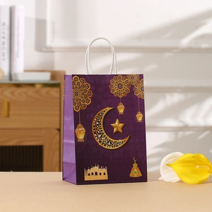 Purple Ramadan paper gift bag with gold moon and mosque castle prints and white rope handles