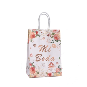 Elegant white wedding gift bag with rose gold Mi Boda text and floral prints