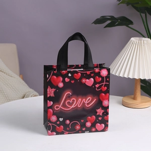 Waterproof non-woven Valentine gift bag with Love neon print and heart pattern