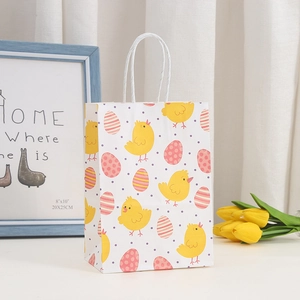 Easter gift paper bag featuring cartoon chick and colorful eggs with rope handles
