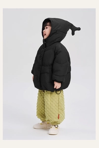 Detail of kids black hooded down jacket with cute ear accents and yellow bubble texture pants