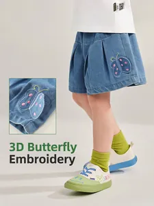 Girls sweet light blue denim shorts with 3D butterfly embroidery and pleated hem