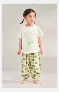 Detail of breathable kids' summer mosquito pants with geometric patterns and soft cotton fabric