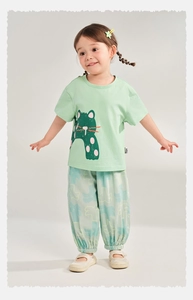 Child in light green cat t-shirt and blue printed mosquito pants for summer wear