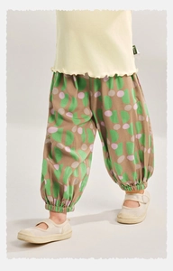 Detail of children's mosquito pants with geometric prints and elasticated ankle cuffs