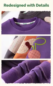 Detail of baby sweatshirt featuring colorful cherry patchwork and ribbed cuffs and neck
