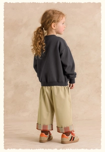 Rear view of soft charcoal grey rabbit sweatshirt and khaki wide-leg pants for girls
