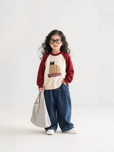 Girls' casual outfit with raglan colorblock sweatshirt and wide-leg denim jeans