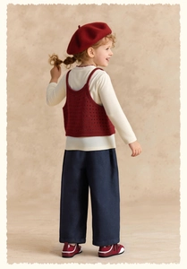 Kids vintage autumn outfit with burgundy knit vest and navy wide-leg leisure pants