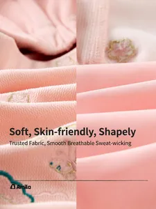 Jupe rose pour fille en maille gaufrée avec broderies délicates de papillons et fleurs