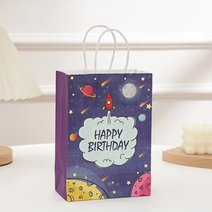 Sac cadeau espace en papier kraft avec fusée et planètes pour un joyeux anniversaire
