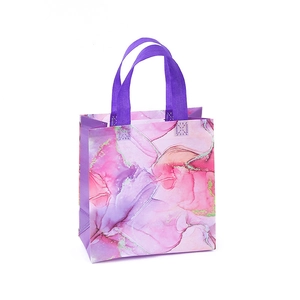 Pink and purple marble pattern non-woven gift bag with reinforced purple handles