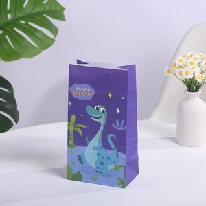 Sac cadeau en papier kraft violet avec un dinosaure bleu et texte Happy Dino