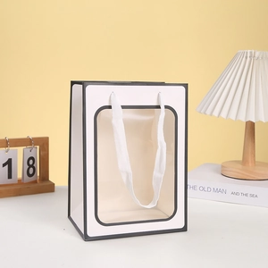 Minimalist white marble pattern gift paper bag with transparent window and ribbon handle
