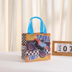Orange monster truck gift bag with blue handles and racing check pattern