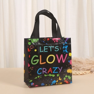 Detail of Let's Glow Crazy neon print on a black textured non-woven gift bag with handles