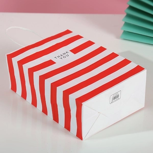 Brown kraft paper gift bag with red horizontal stripes and Thank You logo