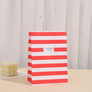 Red and white striped kraft paper gift bag with Thank You print and white rope handles