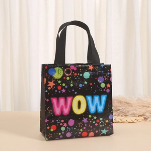 Detail of waterproof non-woven gift bag featuring colorful WOW print and durable handles