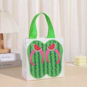 Detailed view of non-woven waterproof gift bag with summer flip-flop and watermelon print