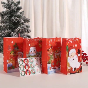 Detailed set of Christmas kraft gift bags with cartoon Santa patterns and stickers