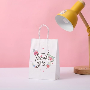 Sac cadeau en papier kraft blanc Thank You avec motifs floraux et poignées pour fêtes