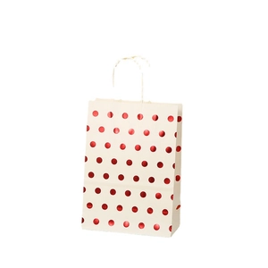 Polka dot kraft paper gift bag with metallic red dots and white rope handles