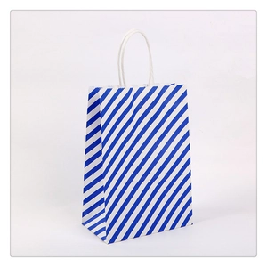 Vertical kraft paper gift bag with blue and white diagonal stripes and twisted handles